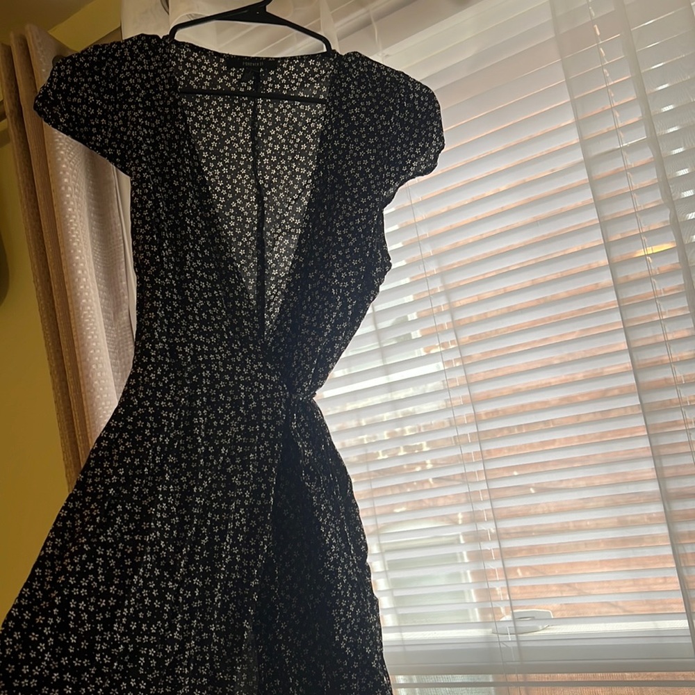 Wrap dress. Only worn once just not didn’t fit my upper half as well as I’d like